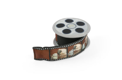 Film reel with a strip of film showing images on a white background