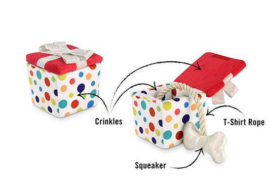 Diagram of a colorful polka dot pet toy with labeled parts on a white background